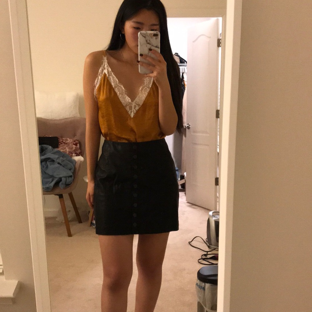 black mini leather skirt